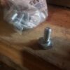 65-71 Sweptline Tailgate Hinge Bolt NOS - Image 2