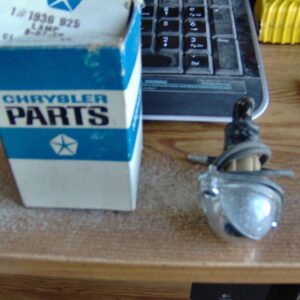65-71 NOS License Plate Light Assembly